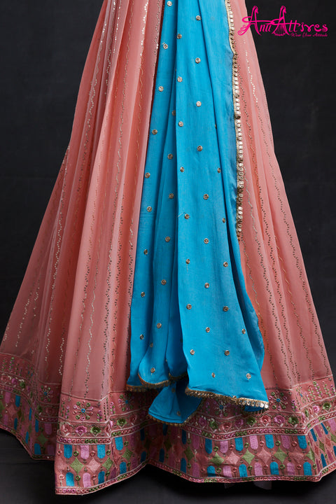 Peach and Blue Georgette Gown with all over Sequence and belt