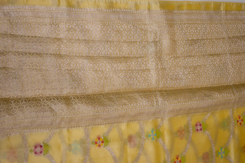 Yellow Chiniya Silk Saree with Pastel Floral Motifs and Zari Border