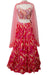 Mannequin wearing a pink and red patterned outfit with a sheer overlay on a white background