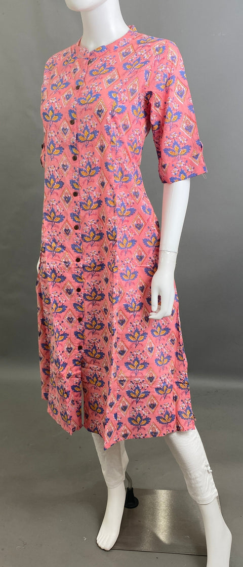 Pink floral printed kurta for women with button-down front and half sleeves.